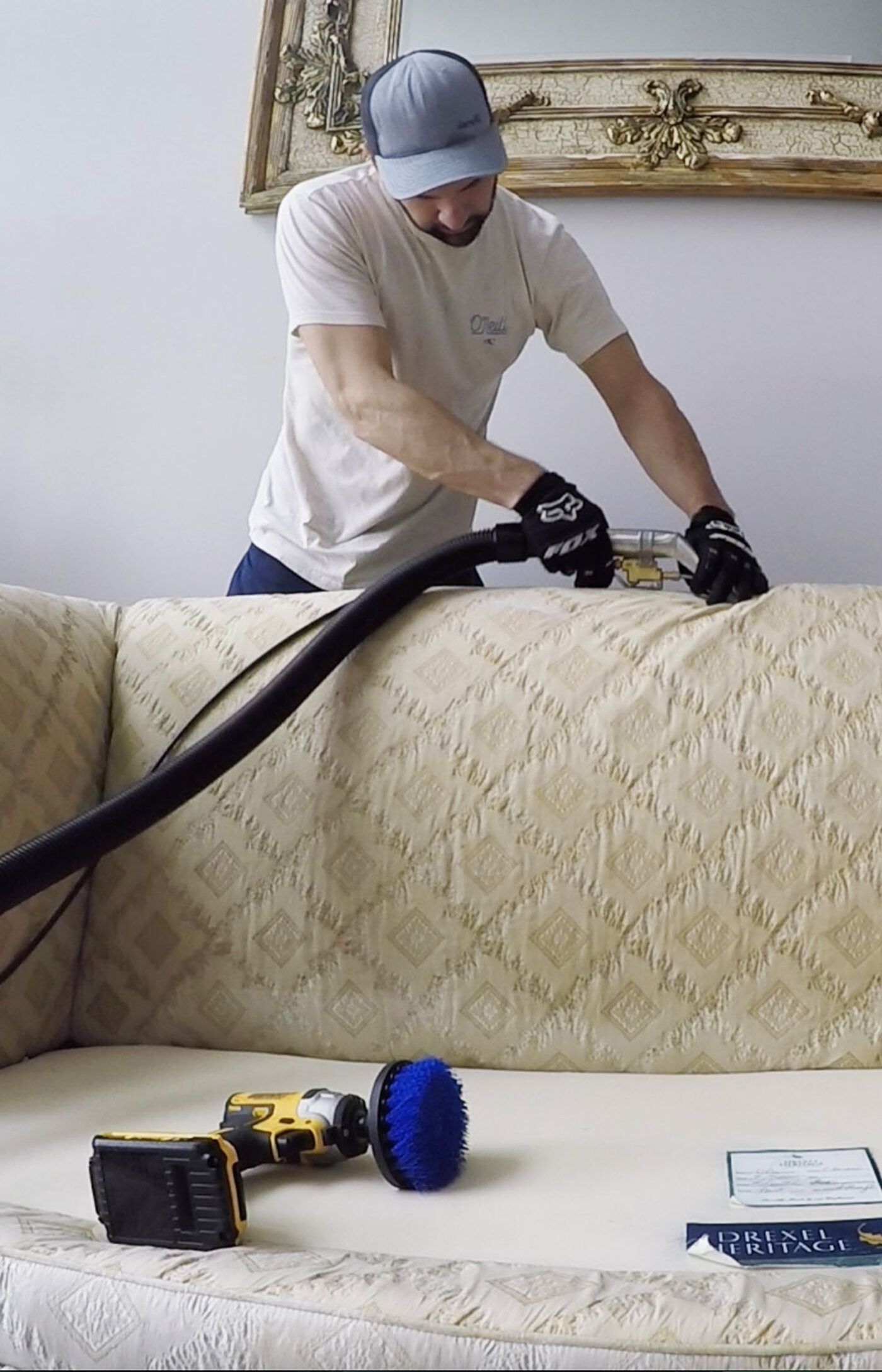 Steven Reith cleaning a sofa with a hot-water extraction wand